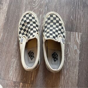 Vans Black and Cream Checkered Slip-On Sneakers